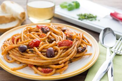 Bucatini Puttanesca with olives and tomatoes